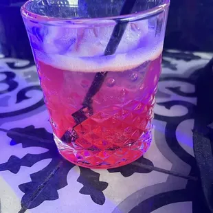 a glass of cherry vodka