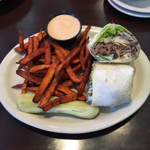 Prime rib wrap w sweet potato fries.