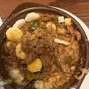 Chili with oyster crackers. About half eaten at this point. No beans or tomatoes, hardly any peppers. More like a sloppy joe