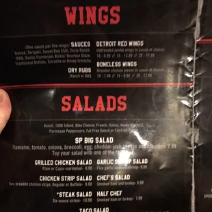 a menu for wings salads