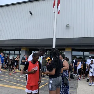Entrance to the building, players and spectators forced to wait outside