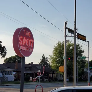 a stop sign on a street corner