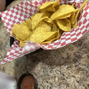 They bring chips and salsa to the table.