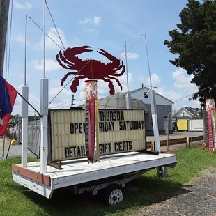 a sign with a crab on it