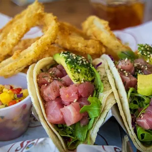 Ahi tuna tacos with onion rings.