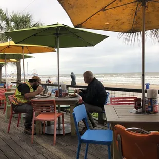 It was a bit too breezy/chilly/rainy for us to eat out on the patio but these brave guys did