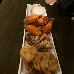 Sampler with fried green tomatoes, grilled shrimp and bone in hot wings.