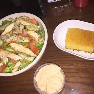 Grilled chicken salad and cornbread.