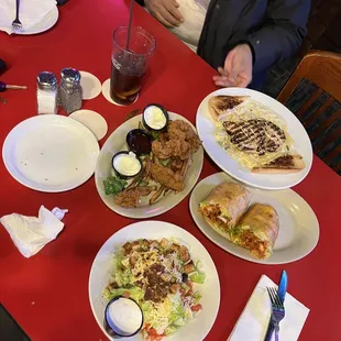 plates of food on a red table