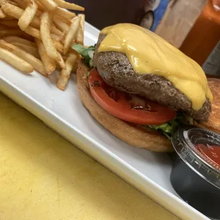 a cheeseburger and fries