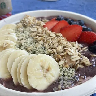 a bowl of fruit and oatmeal