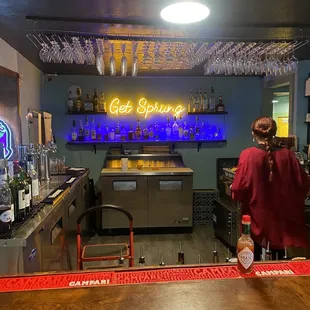 a bartender at the bar