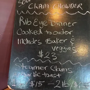 a blackboard with a menu written on it