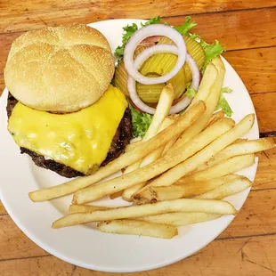 a hamburger and french fries on a plate