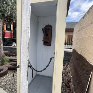 Antique phone booth too small for Superman, lol