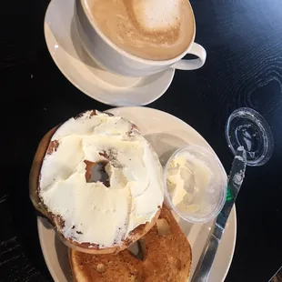 Latte and Asiago bagel with cream cheese.