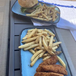 Burger and fries and chicken tenders