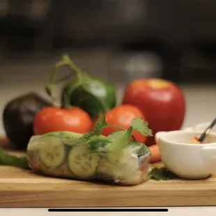 a cutting board with a variety of vegetables