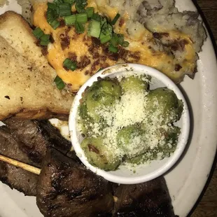 Steak bites, loaded mashed potatoes, brussel sprouts