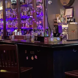 a bar with purple lights
