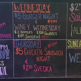 a chalk board with a variety of schedules