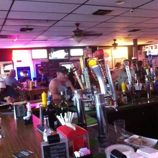 Bar is almost full and all tables have been occupied.