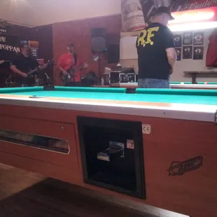 a man playing pool