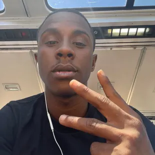 a young man with earphones on