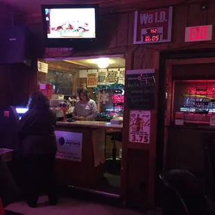 a bar with a television in the background