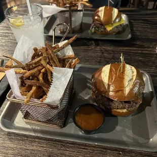 Standard burgers...one without cheese and lettuce...with a side of bbq sauce.