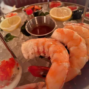 Seafood tower.  Little Neck Clams and Enormous shrimp