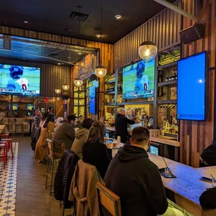 people sitting at the bar