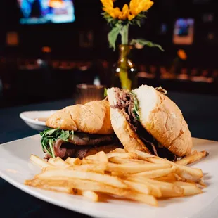 a burger and fries on a plate