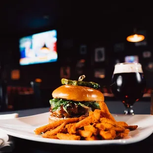 a burger and fries on a plate