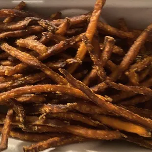 a container of sweet potato fries