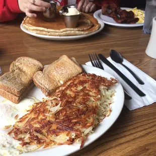 Eggs over-easy, Hashbrowns, and Wheat Toast