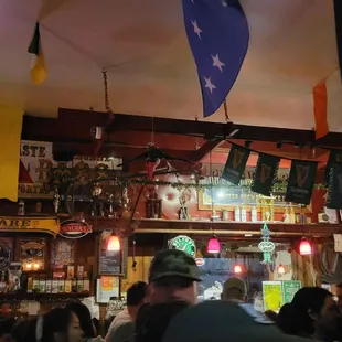 a crowd of people at a bar