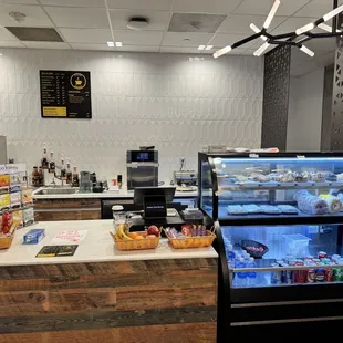 a counter with a variety of food items