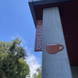 a cup of coffee on a pole