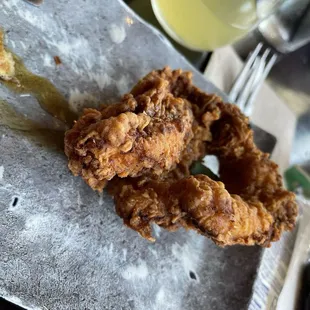 The chicken portion of the chicken and waffles