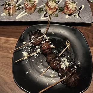 Bruschetta on the top , bacon wrapped dates on the bottom