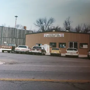 trucks parked in front of the station house