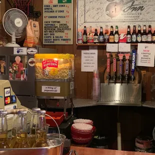 a bar with a variety of beverages