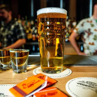 a pint of beer on the bar