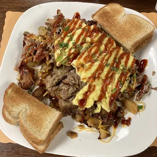 This is the Garbage Plate. Pulled pork, burnt ends &amp; bacon sold me. This is a breakfast!