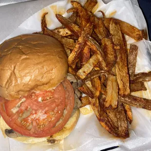Mushroom swiss burger with fries