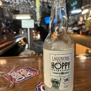 a bottle of beer on a table