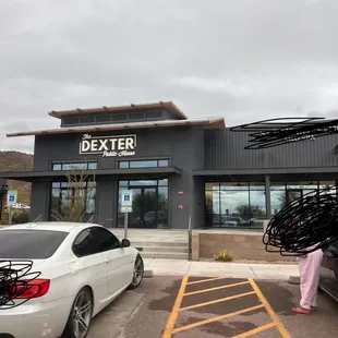 a car parked in front of a store