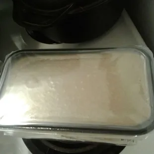 tray sticky toffee pudding, very thick layer of toffee sauce, when heated the sauce turns dark brown and bubbly... Outrageously awesome!