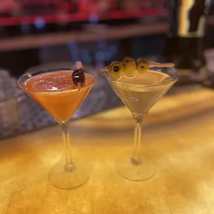 Lush blush martini and vodka martini with blue cheese stuffed olives